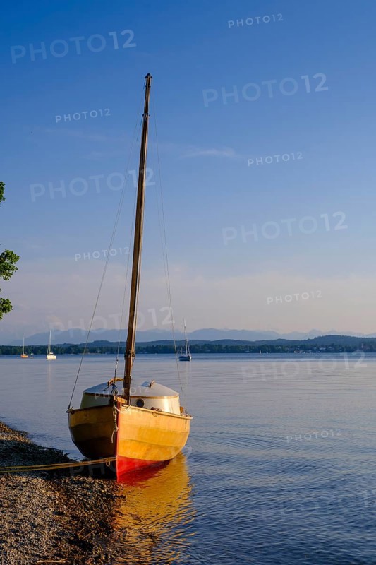 Small sailboat on the shore