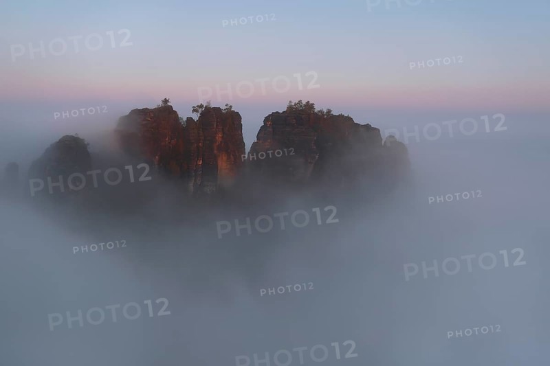 Autumn fog at sunrise