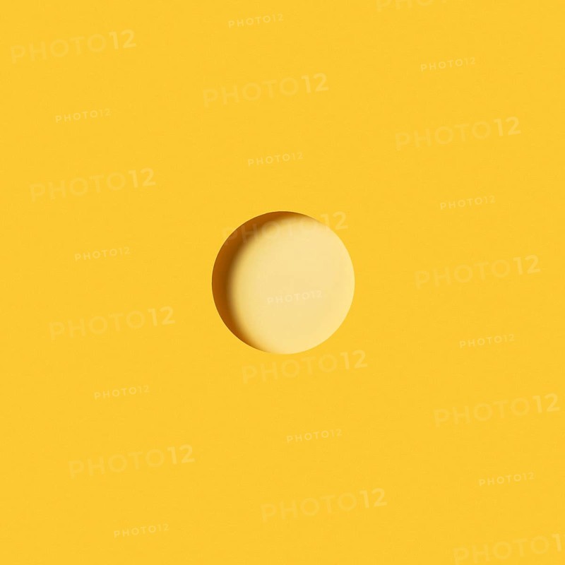 Modern background with light yellow circular piece paper