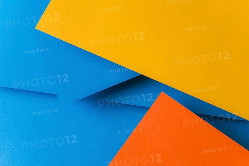 Blue orange yellow color papers background