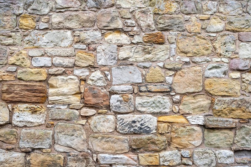Wall stones made of different types of stone