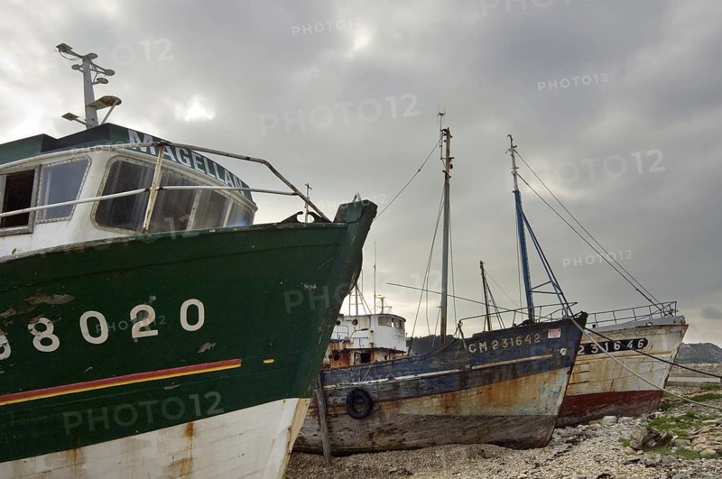 Wrecks of old trawler fishing boats in the harbour of Camaret-sur-Mer