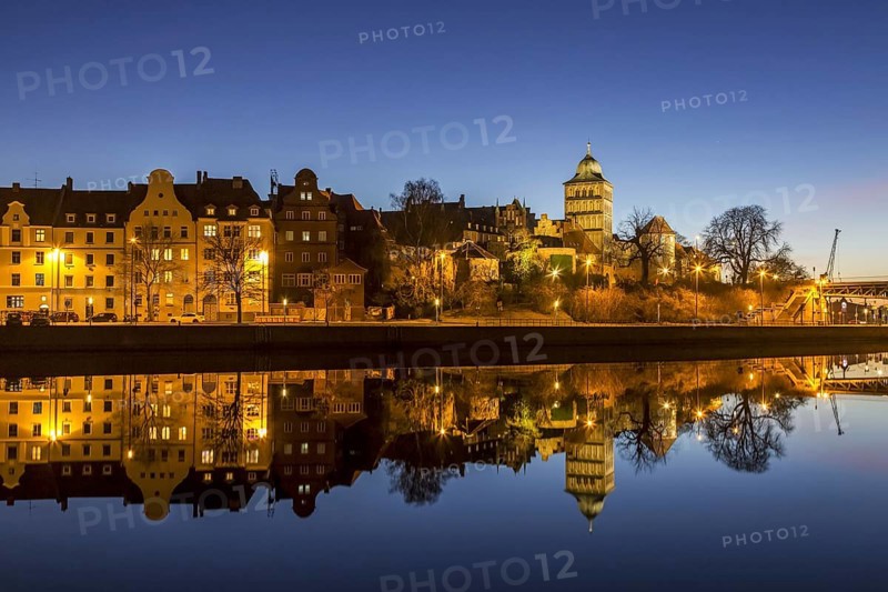 Gothic Burgtor Gate reflected in water of the Elbe Luebeck Canal