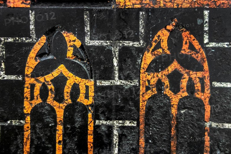 Detail of medieval epitaph on gravestone