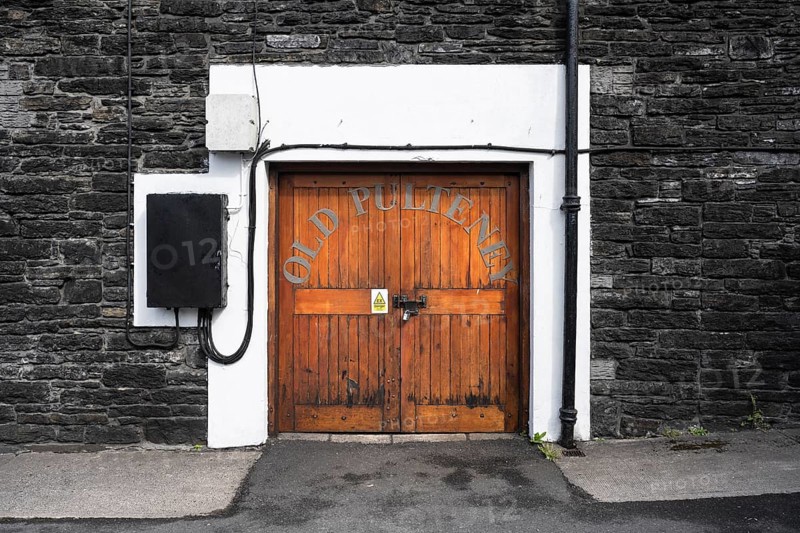 Wooden door to the warehouse of the Old Pulteney whisky distillery in Wick