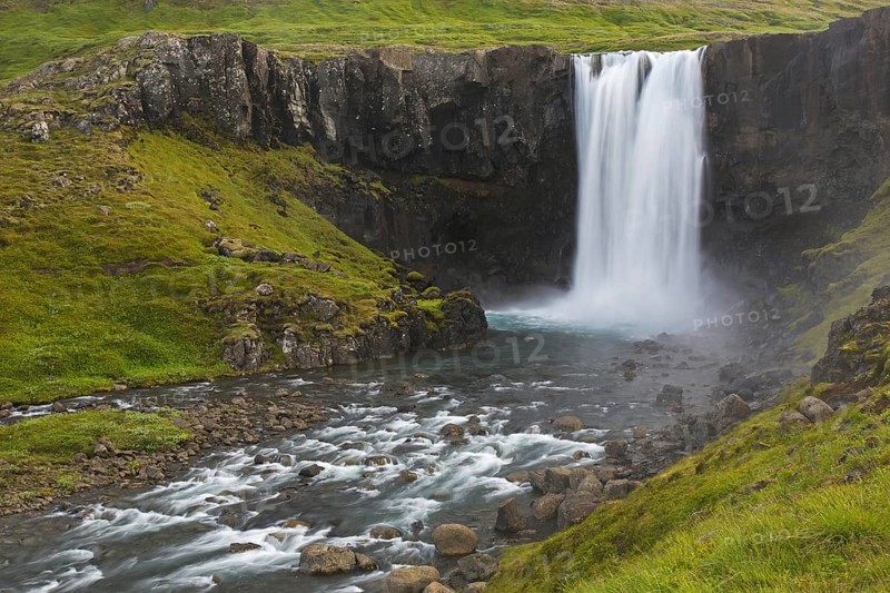 Gufufoss waterfall in summer on the Fjaroara river flowing in the Seyoisfjoerour