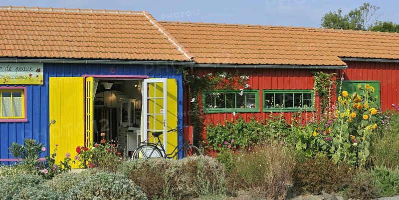 Colourful cabins of oyster farmers renewed and converted into arts and crafts shops at the harbour of Le Chateau-d'Oleron on the island Ile d'Oleron