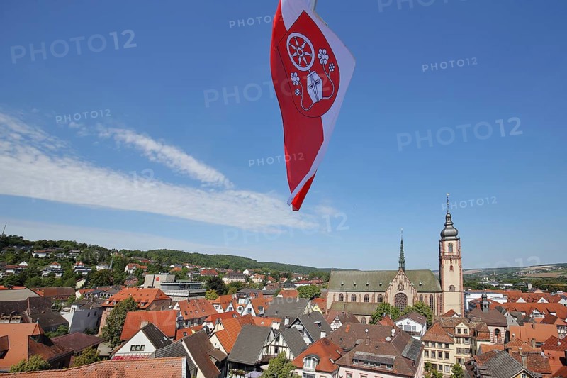 View from the tower with the town flag on the townscape with St. Martin's church