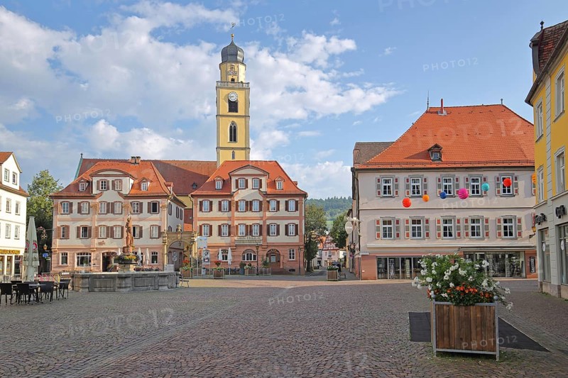 Twin houses and tower of St. John's Minster Church