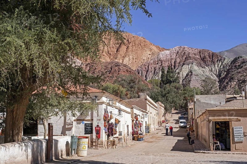 Street with souvenir shops in the village Purmamarca at the foot of Cerro de los Siete Colores