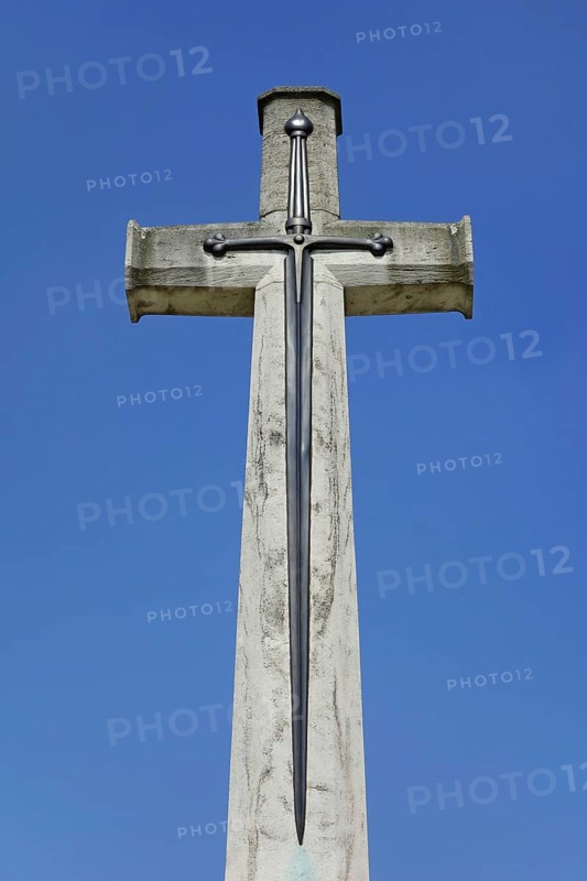 Cross of Sacrifice at military cemetery of the Commonwealth War Graves Commission burial ground for First World War One British soldiers in West Flanders