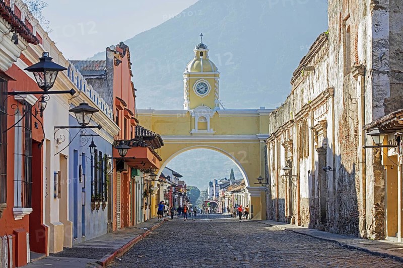 Colourful colonial houses and the 17th century Arco de Santa Catalina Arch in the city Antigua Guatemala