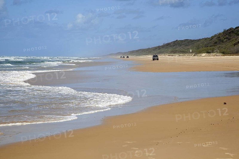 4X4 SUVs driving on the beach of Fraser Island