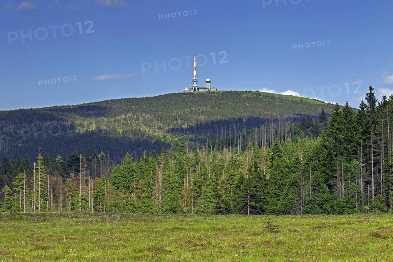 Old transmission tower and new television tower