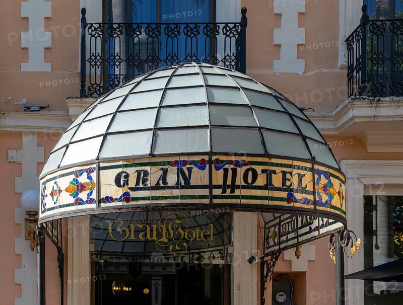 Stained glass canopy entrance to Gran Hotel