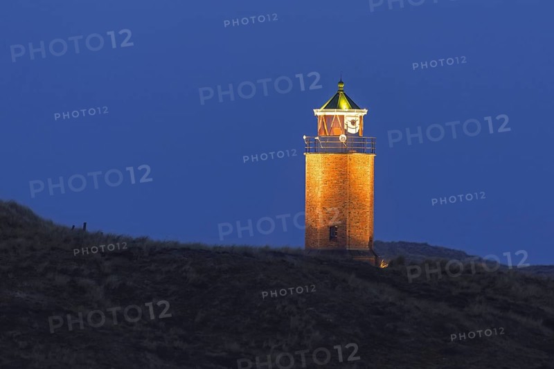 Rotes Kliff lighthouse at night at Kampen on the island of Sylt