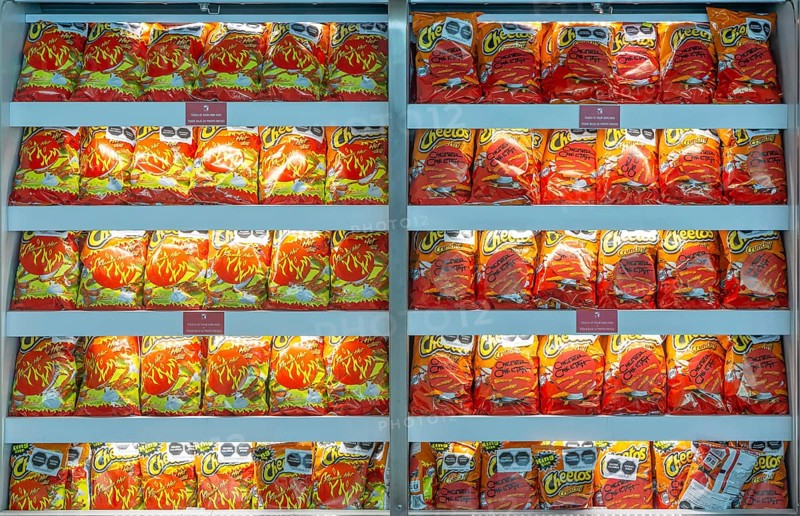 Display rows in shop of packets of Cheetos crips