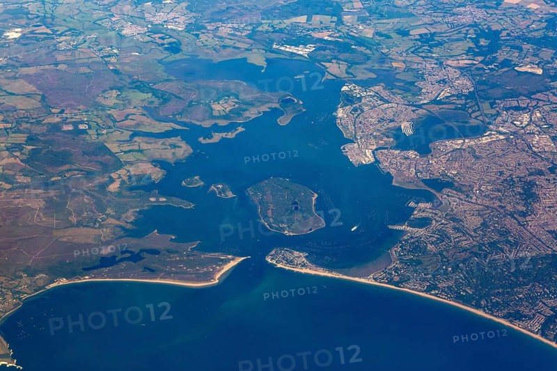 Oblique aerial view through plane window of Brownsea Island