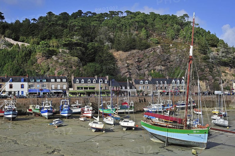 Colourful fishing boats in the harbour of Erquy