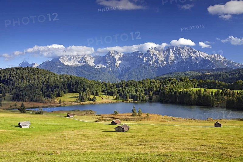 The Karwendel Mountain Range and huts along lake Gerold