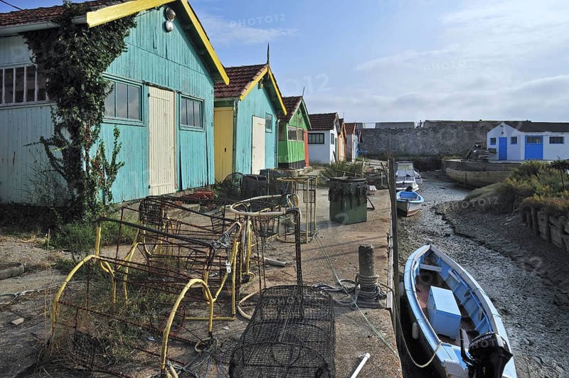Colourful cabins of oyster farmers in the harbour at Le Chateau-d'Oleron on the island Ile d'Oleron