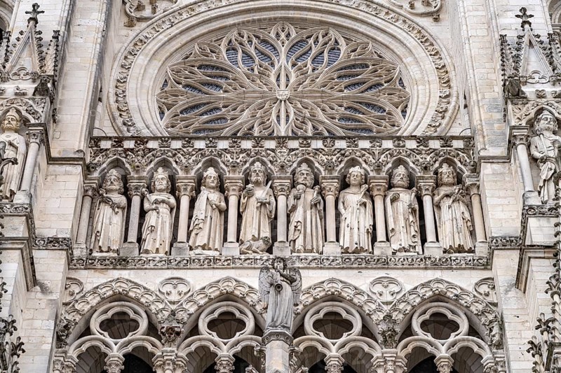 Statues of the Kings and rose window on the west facade of Notre Dame d'Amiens Cathedral