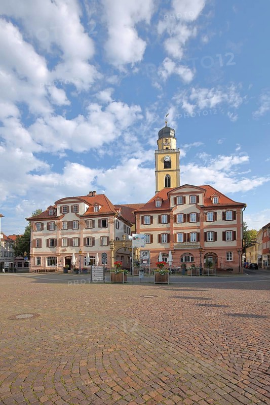Twin houses and tower of St. John's Minster Church