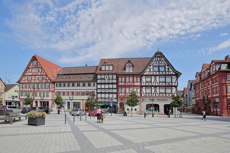Left Building Thurn- und Taxissche Post built 1550 and historic half-timbered houses