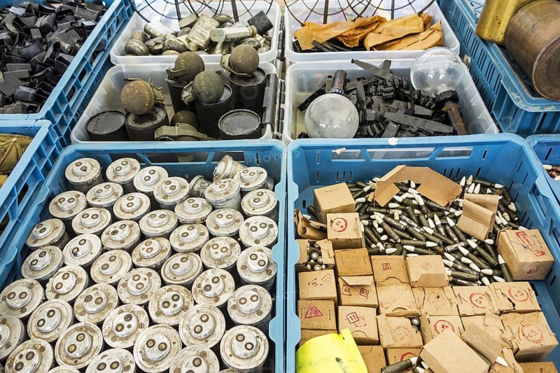 Stand at militaria fair selling World War Two memorabilia like bomb fuzes