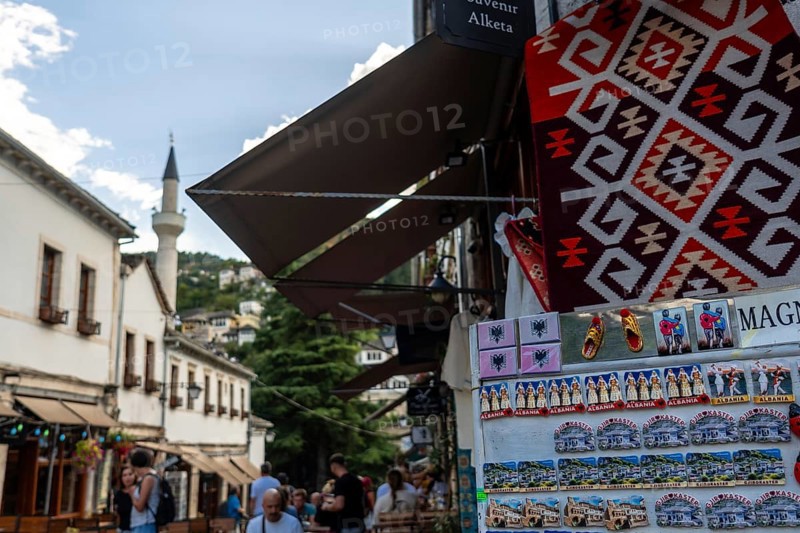 Street from the restaurant and souvenir area to the city of Gjirokaster or Gjirokastra. Albanian