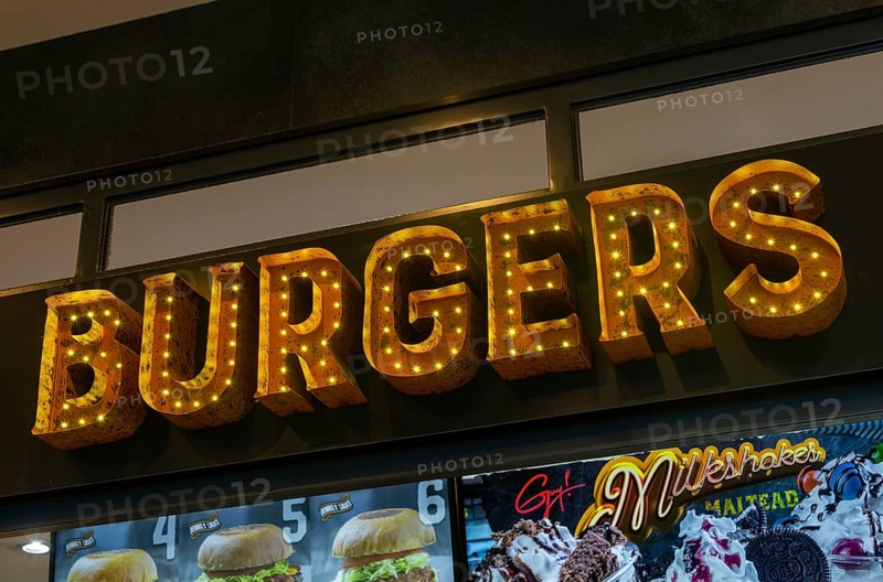 Burgers sign at Flavortown cafe restaurant bar