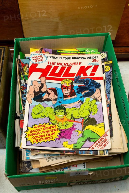Box of The Incredible Hulk comics on display in auction room