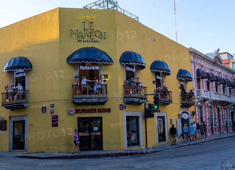 Le Makech restaurant people sitting on balconies in evening
