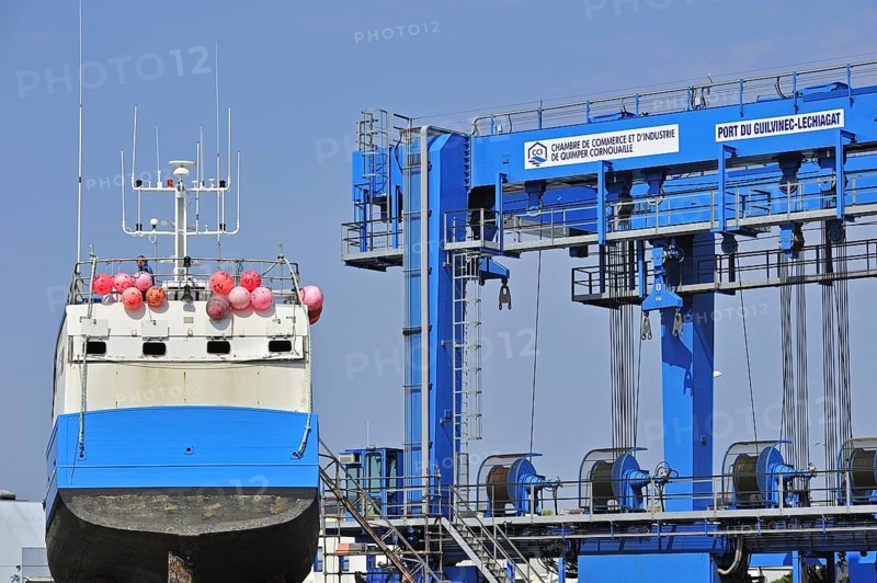 Trawler fishing boat on shipbuilding yard for maintenance works in the Guilvinec port
