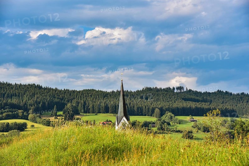 Church tower of the Catholic parish church Stankt Pelagius in the municipality of Weitnau in Oberallgaeu