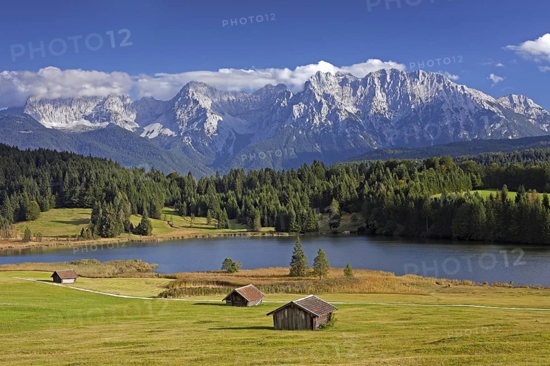 The Karwendel Mountain Range and huts along lake Gerold