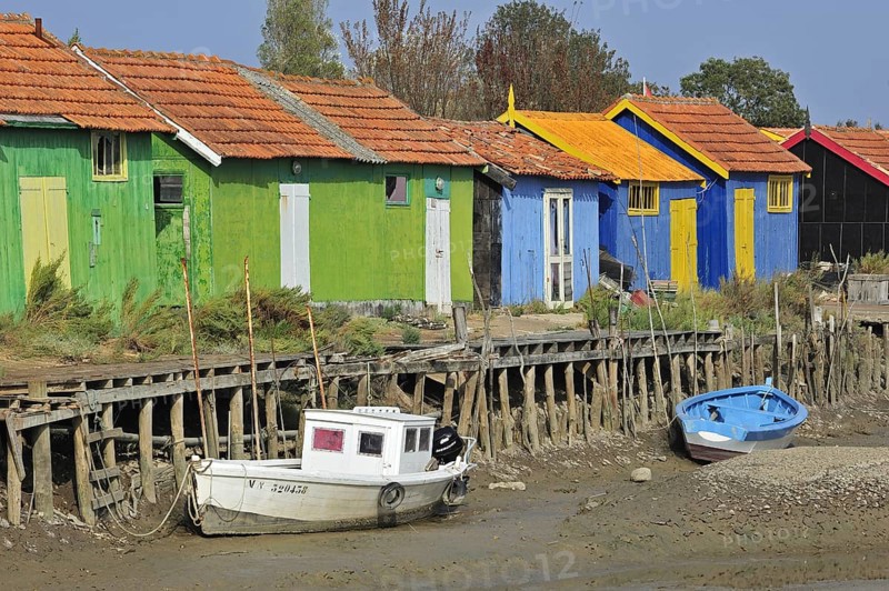 Colourful cabins of oyster farmers in the harbour at Le Chateau-d'Oleron on the island Ile d'Oleron