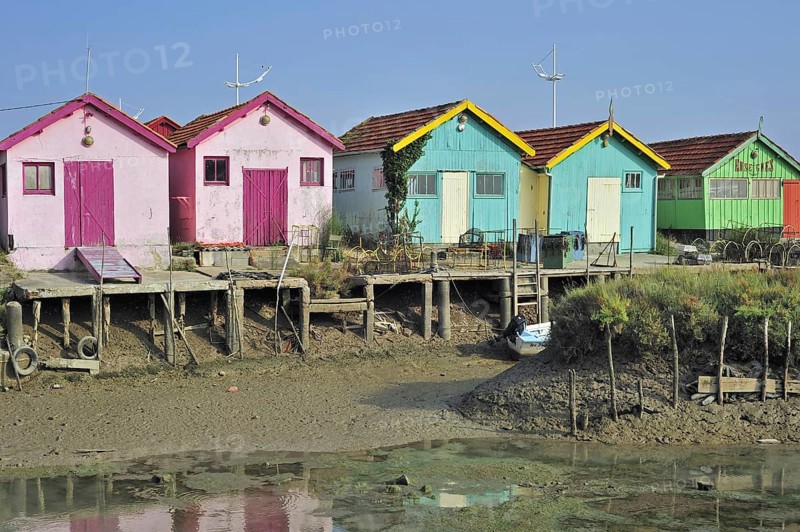Colourful cabins of oyster farmers in the harbour at Le Chateau-d'Oleron on the island Ile d'Oleron