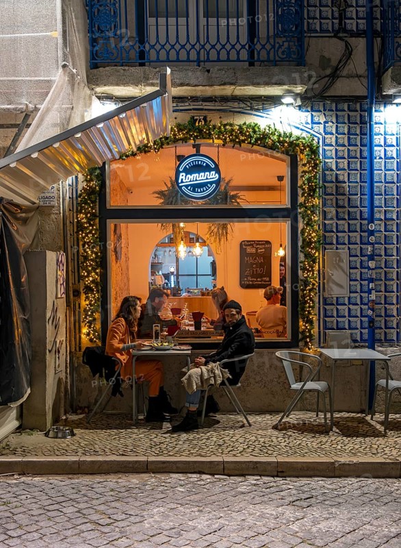 Outdoor restaurant in Alfama by night