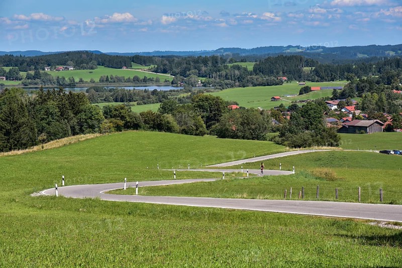 The country road up the Auerberg near Benbeuern in the district of Weilheim-Schongau