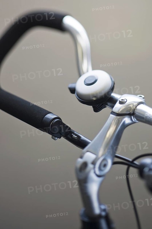 Close up of bike bell mounted on trekking bars