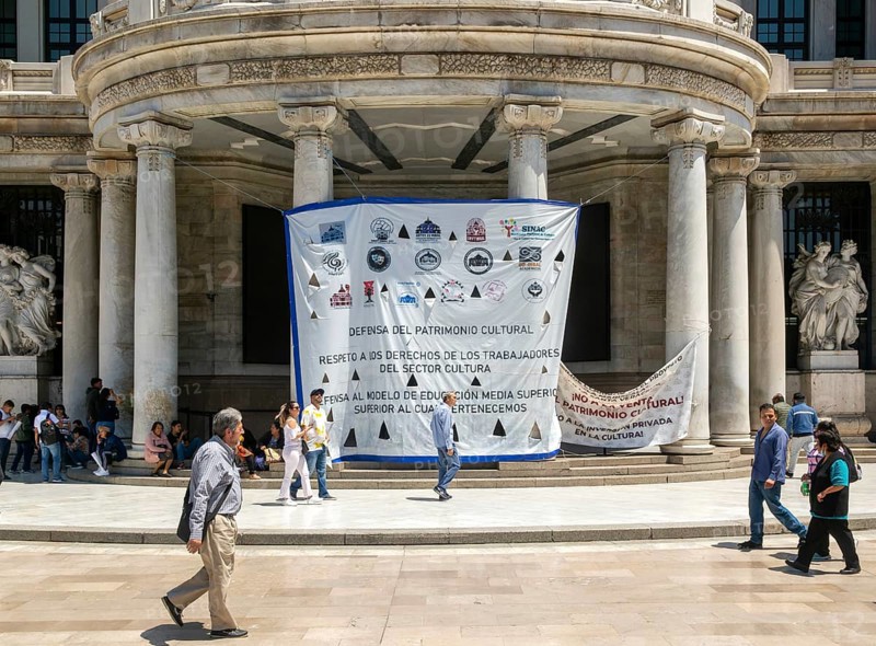 Protest posters banners outside Palacio de Bellas Artes