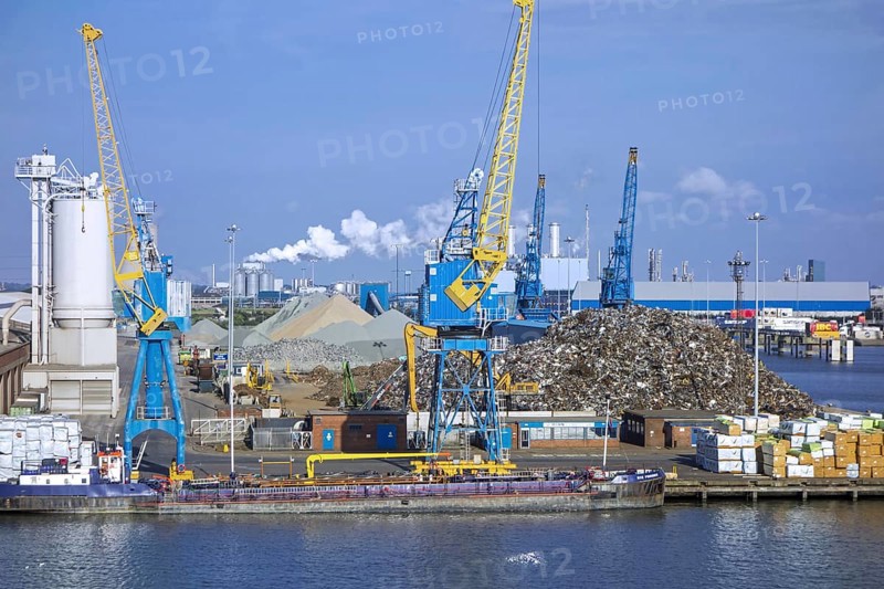 Dock cranes and scrap metal heap in the Aberdeen port