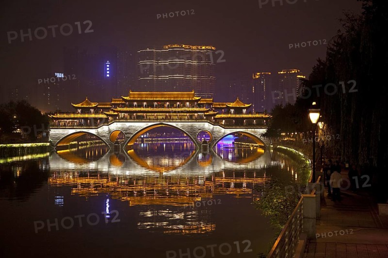 Illuminated Anshun Bridge over the Jin River at night in the provincial capital of Chengdu in Sichuan