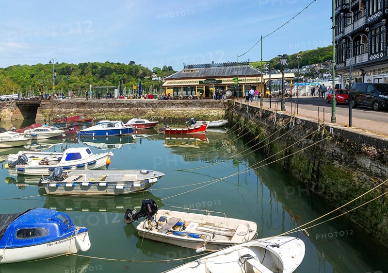 Boats moored in inner harbour view to Embankment cafe bistro