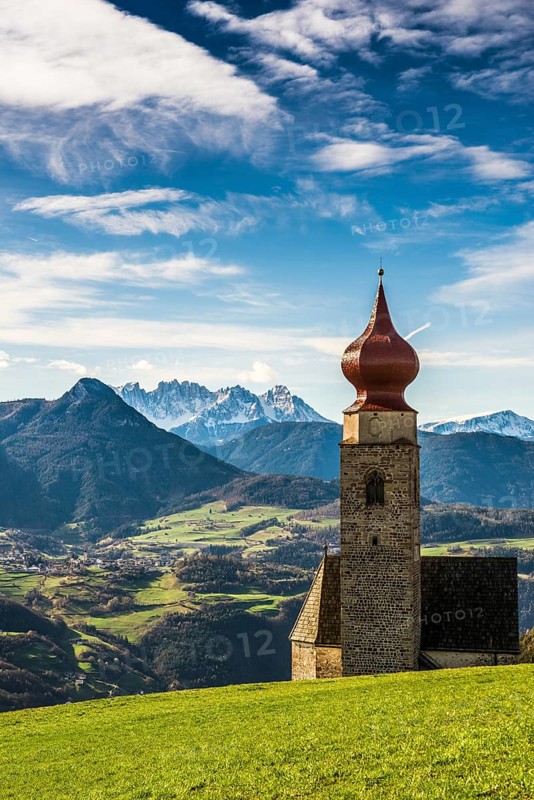 Snow-covered mountains and church