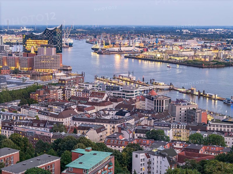 Aerial view of Hamburg harbour at blue hour with Landungsbruecken and Elbe Philharmonic Hall