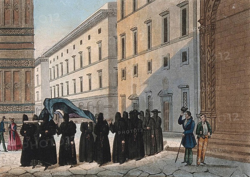 Monks carrying a corpse in a religious funeral procession