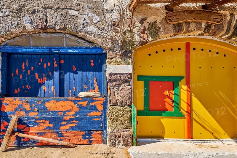 Colorful blue and yellow boat garage doors