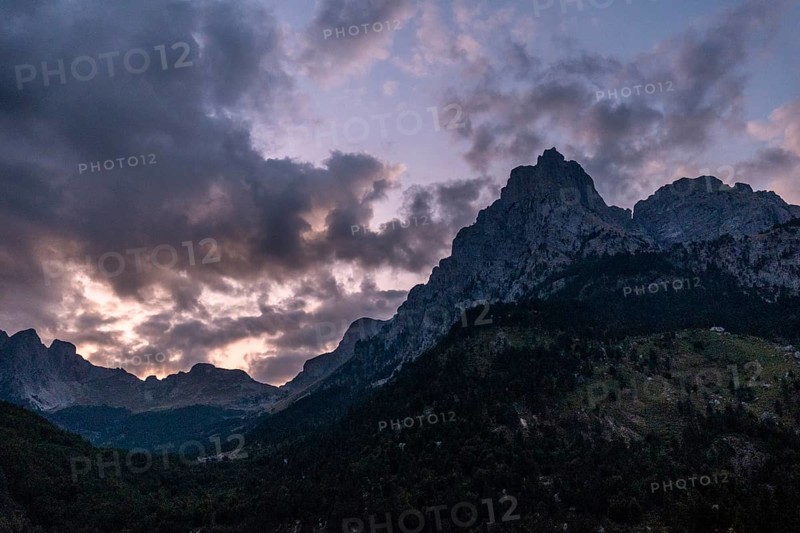 Night falls in the Valbona Valley along a trail